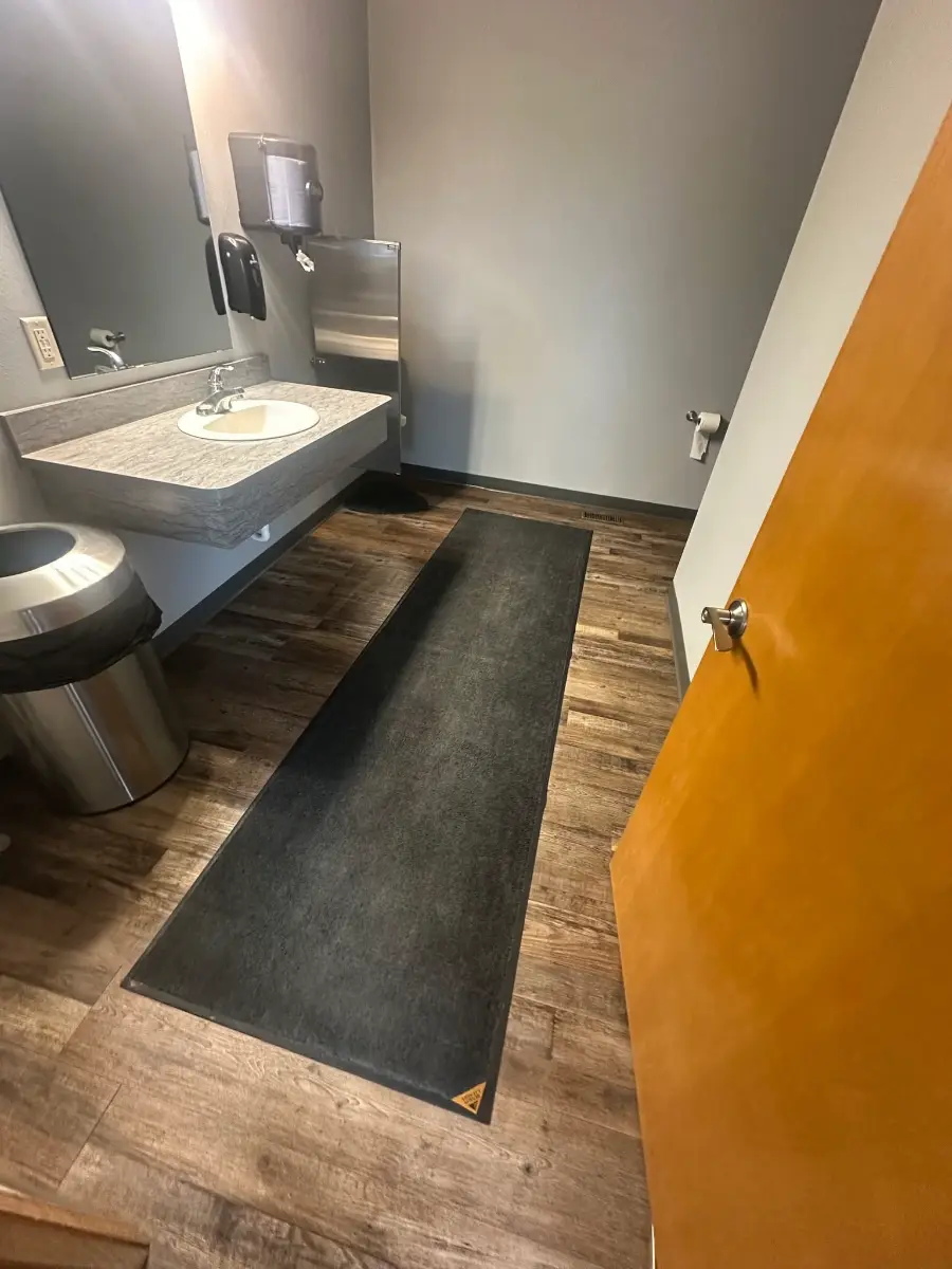 Commercial restroom maintained under a janitorial contract